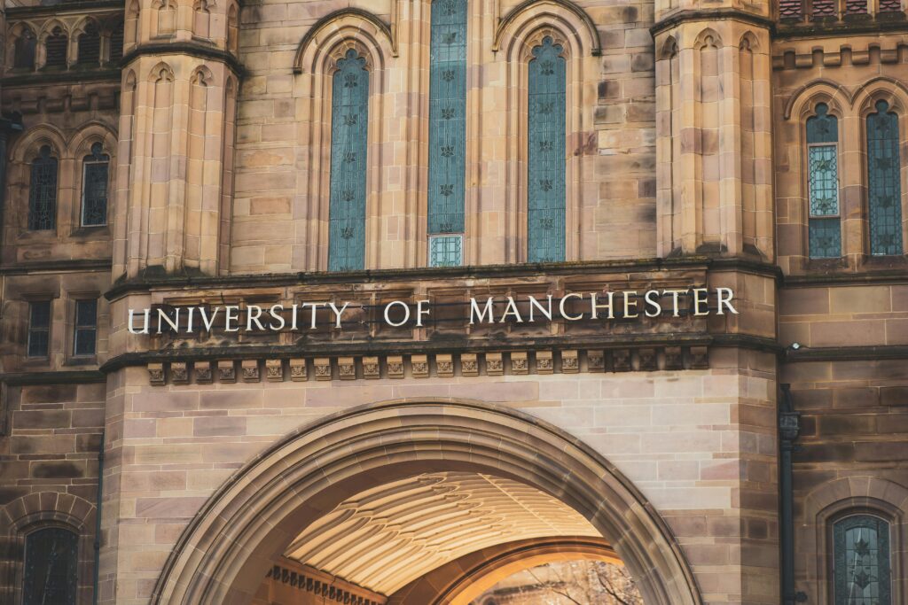 Close-up of the University of Manchester's architectural details with Gothic features.